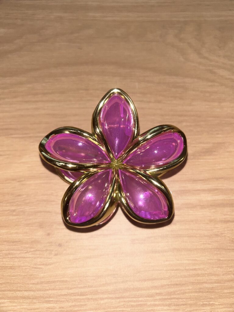 Pince à cheveux fleur — fuchsia translucide et doré