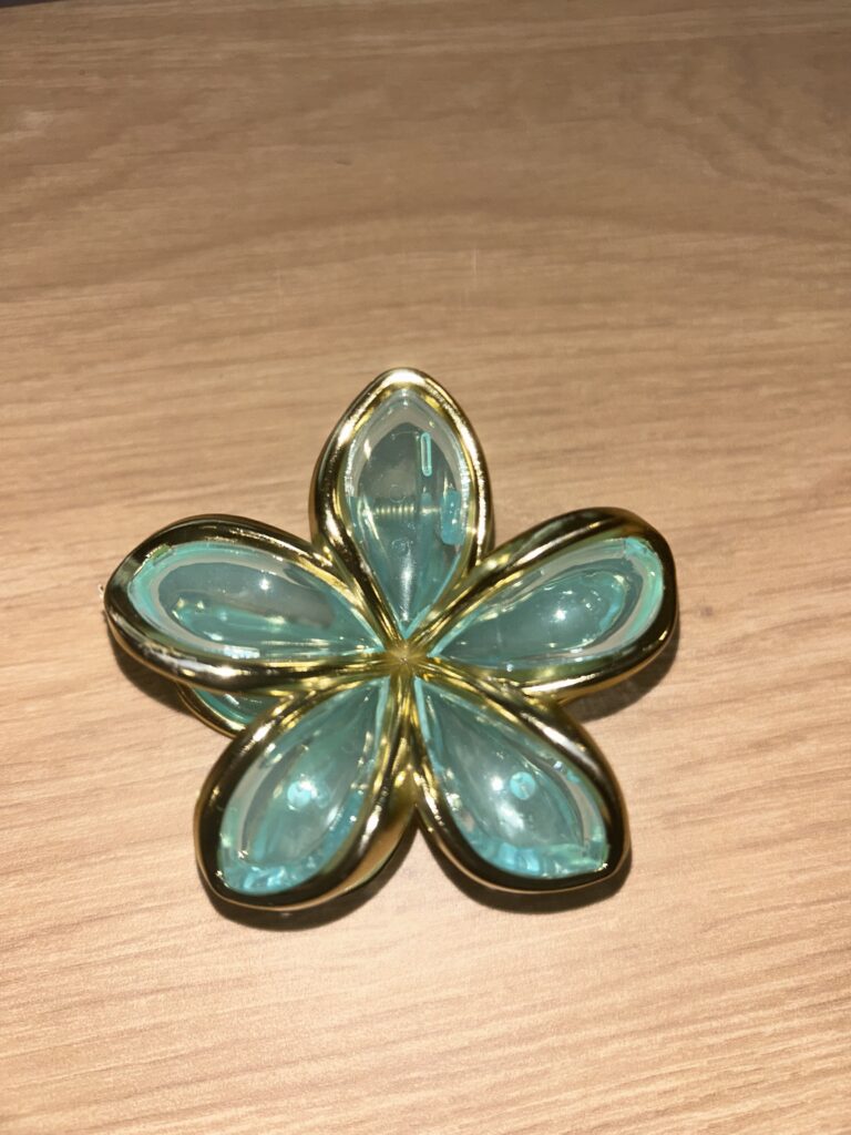 Pince à cheveux fleur — bleu turquoise translucide et doré