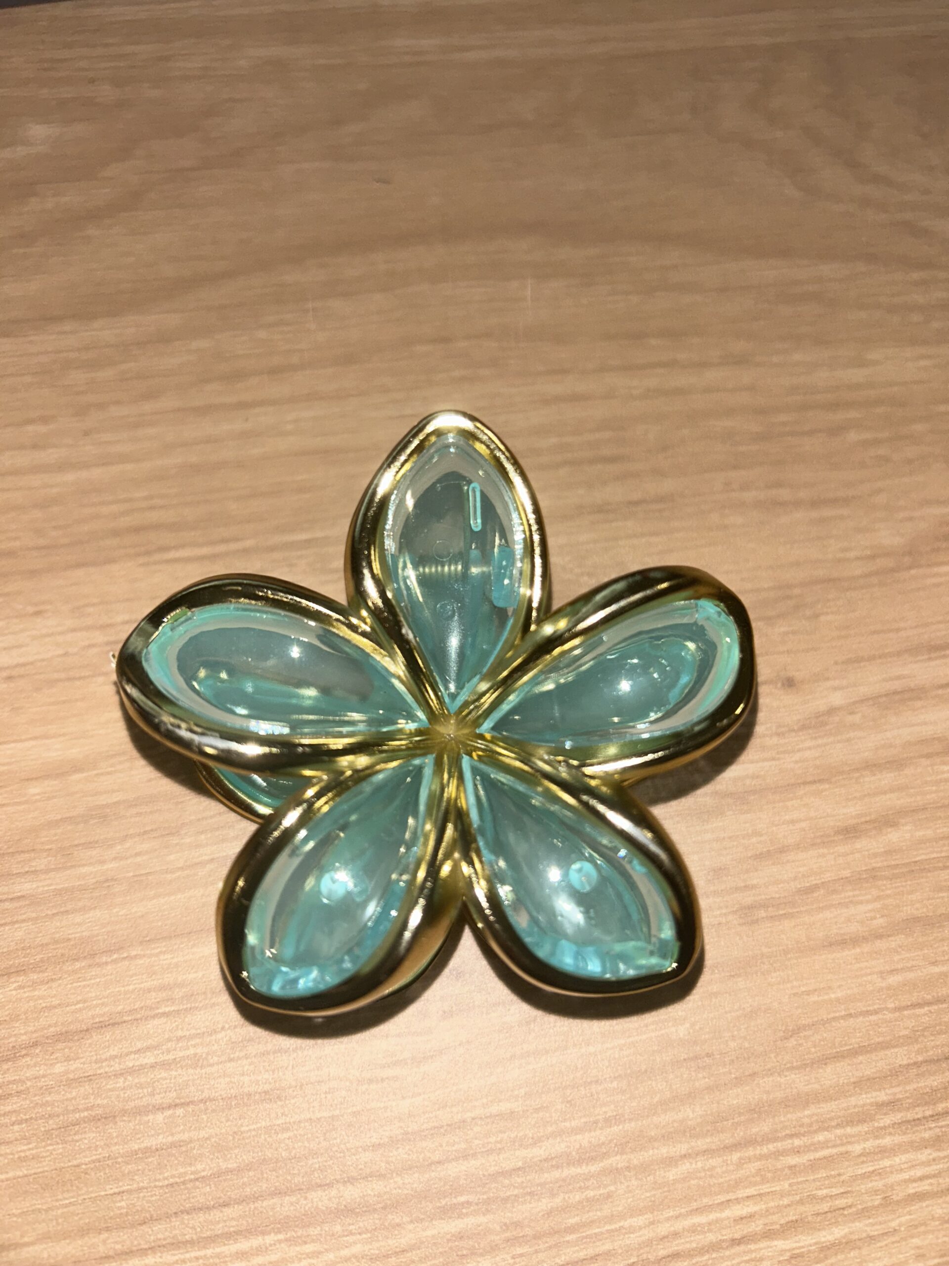 Pince à cheveux fleur — bleu turquoise translucide et doré