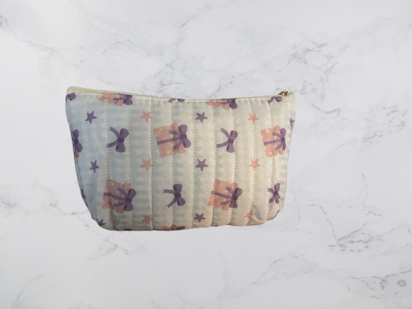 Lot de 2 trousses matelassées — motif nœuds et étoiles – Image 3