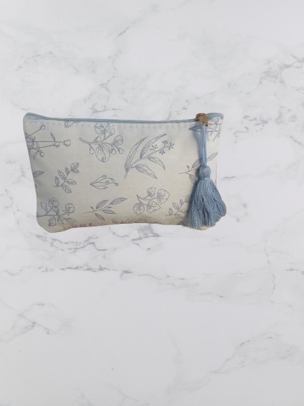 Trousse plate — motif botanique bleu
